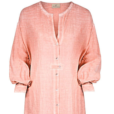 Pink dress with buttons on a white background