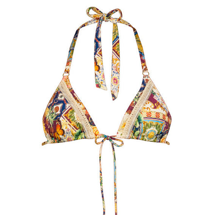 Colorful patterned bikini top on a white background