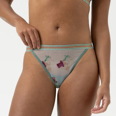 Bikini set with floral and striped design on a plain background