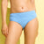 A woman modeling a light blue textured two-piece bikini against a pale yellow background.
