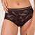 Black lace underwear worn by a person on a neutral background