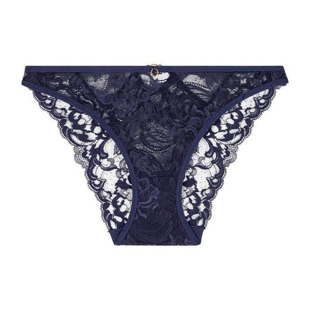 Navy blue lace thong on a white background