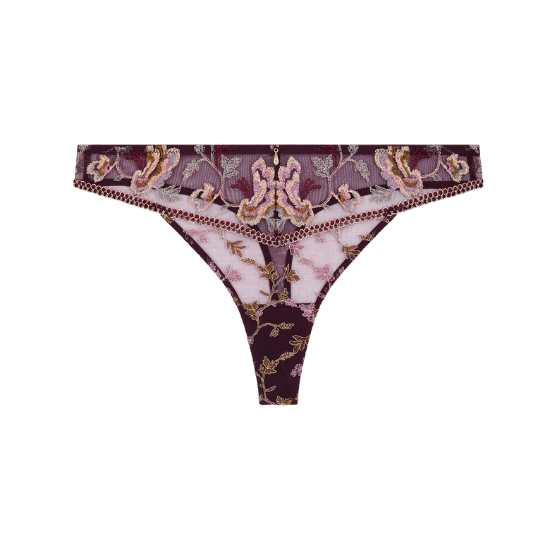 A pair of women's thong underwear featuring a dark purple and pink floral pattern with gold accents, a decorative embroidered waistband, and a small central hanging charm, shown against a plain white background.