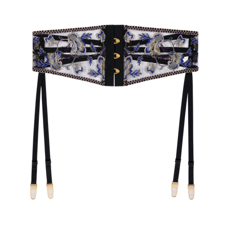 A wide waist belt with an intricate blue and gold floral pattern on a white background, featuring black suspenders with gold-toned metal clips.