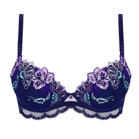 Navy blue bra with intricate lace and floral embroidery on a white background