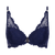 A navy blue lace underwire bra with scalloped edges and a small gold-tone metal accent at the center front, shown against a plain white background.