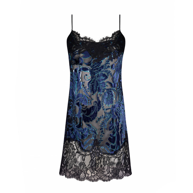 A sheer black lace slip dress featuring a blue and black embroidered pattern on a white background.