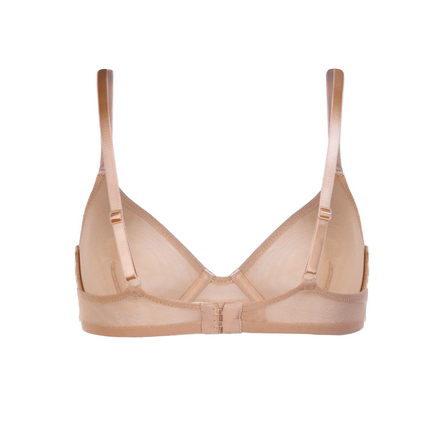 Beige bra and panties set on a white background