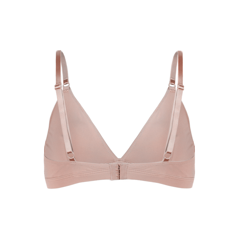 Pink bikini set on a white background