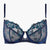 Navy blue bra with floral lace details on a white background
