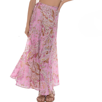 Woman wearing a pink floral two-piece outfit on a white background