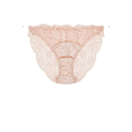 Pink lace underwear on a white background