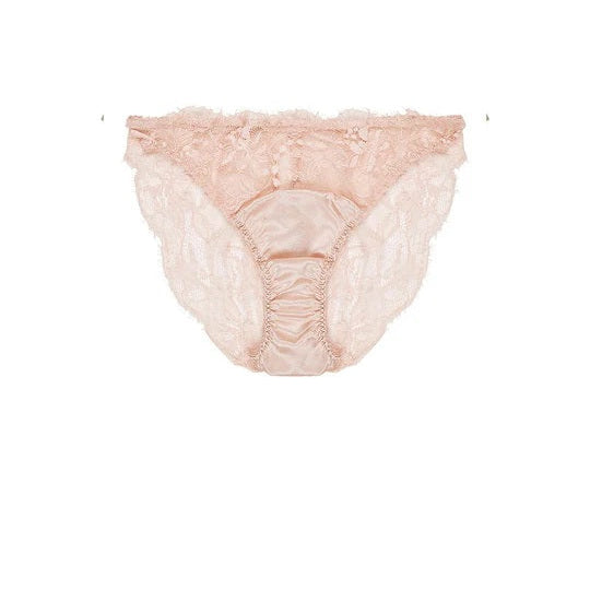 Pink lace underwear on a white background