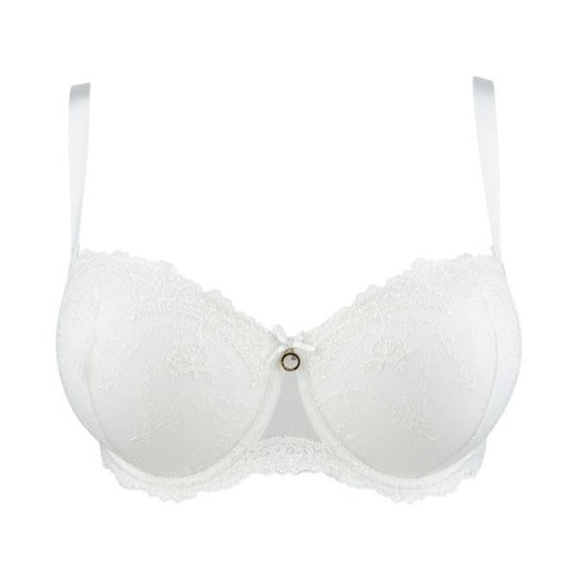 The Aubade Comfort Moulded Strapless Bra creates a straight, rounded cleavage, with full support up to an F cup. Thanks to its wide, removable straps, it can be slipped easily under a bustier top. The Belle d'Ispahan line, in pearl tulle with an embroidered motif is enriched by light lace and a delicate jewel
