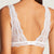 The Aubade Danse Bralette represents a very fashionable shape with exquisite sophistication. The lace traces a triangle of delicate embroidery with the addition of scalloped edging to enhance the floral design. From the top of the shoulders to the curve of the breasts, this non-underwired piece provides a lightweight feel.Featuring very varied designs, this line offers beautiful yet comfortable lingerie in intense Ivory or Teal.