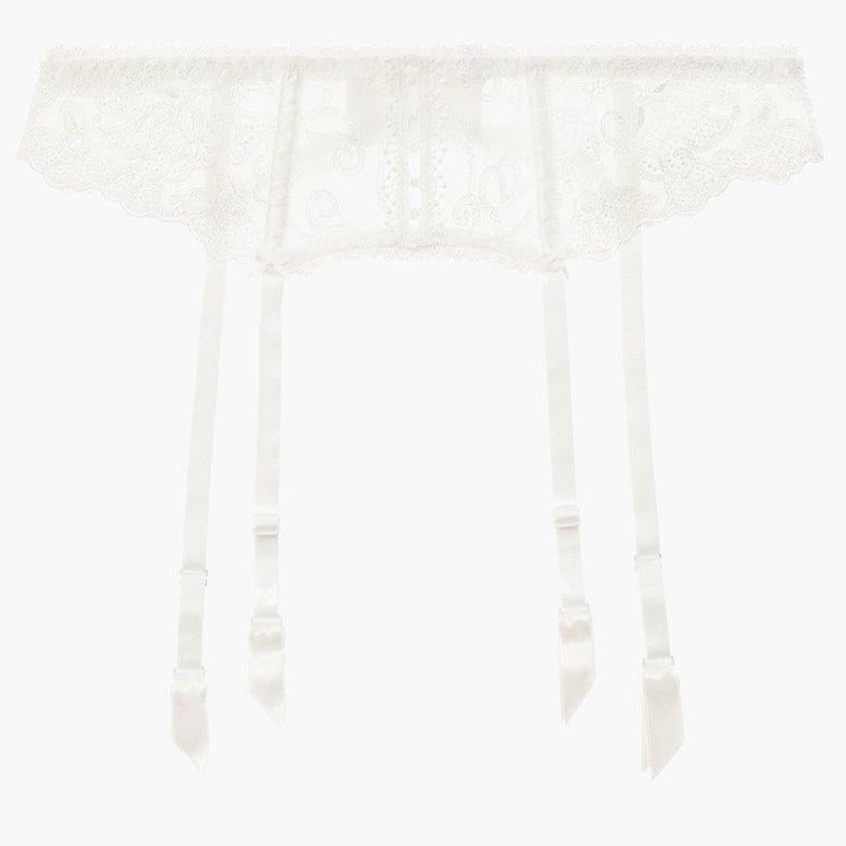 The Aubade Pour Toujours Bridal Suspender Belt is the perfect complement to the bridal lingerie with its romantic, delicate Cornely embroidery. A strip of openwork guipure lace unveils bare skin at the centre, in a charming nod to the buttons found on wedding dresses.