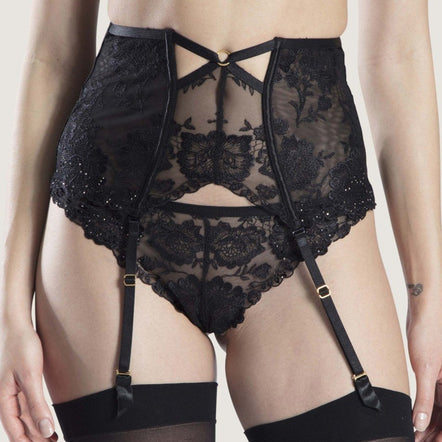 The Aubade Nuit Waistcincher is  adorned with very refined embroidery, flowers join forces with graphic strips. The sultry, deep black pieces are sprinkled with two-tone diamantés to add mysterious sparkle to the curves.